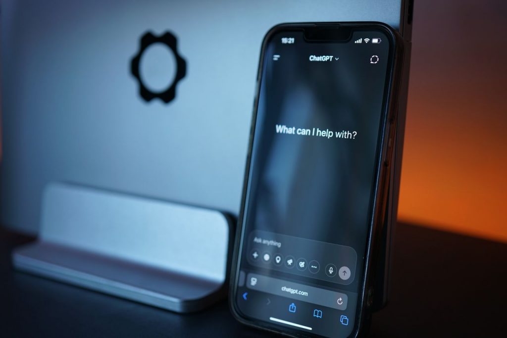 pexels photo 32021560 Close-up of a smartphone with AI chat interface, showcasing advanced technology in a sleek design.